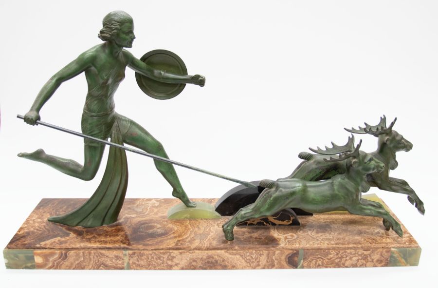 A large spelter and marble Art Deco table/mantle figure of Diana hunting deer, circa 1930's