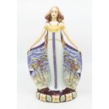 Royal Doulton  - A boxed Les Saisons "Automne" figurine of lady, with floral design along with
