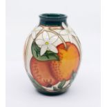 Moorcroft Pottery: A Mediterranean collection "Orange & Blossoms" vase, in box, marked to