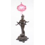 An Art Nouveau designed spelter figure of a lady within floral sprays, with a detachable pink