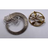 A yellow metal and cultured pearl mistletoe designed brooch, along with a white metal Celtic serpent