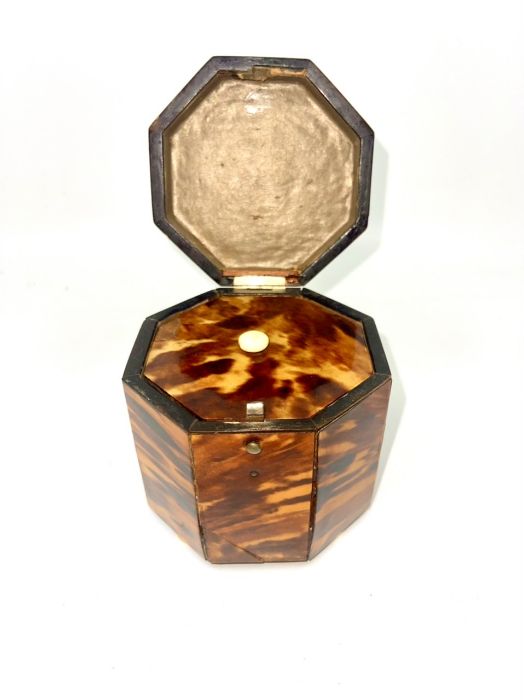 A Regency tortoiseshell tea caddy, circa 1810, in an octagonal shape with dome hinged lid, enclosing - Image 2 of 2