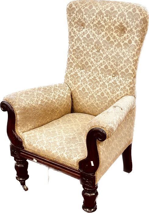 A William IV mahogany library armchair, button bac