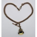 A 9ct stamped rose metal chain with T-Bar plus a rolled gold fob set with a citrine spinner. Gross