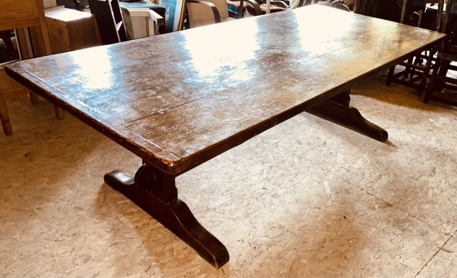 A George III oak trestle table, circa 1790, four plank top with cleated ends, raised on trestle - Image 3 of 7