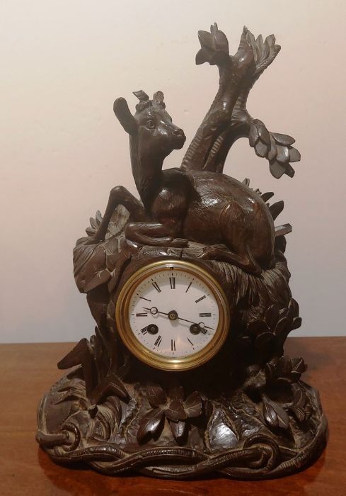 Black Forest Mantel clock with two train French movement serial number 76044 striking on a bell.