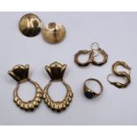 A selection of 9ct gold and yellow metal jewellery. Comprising 3 pairs of  9ct gold earrings (two