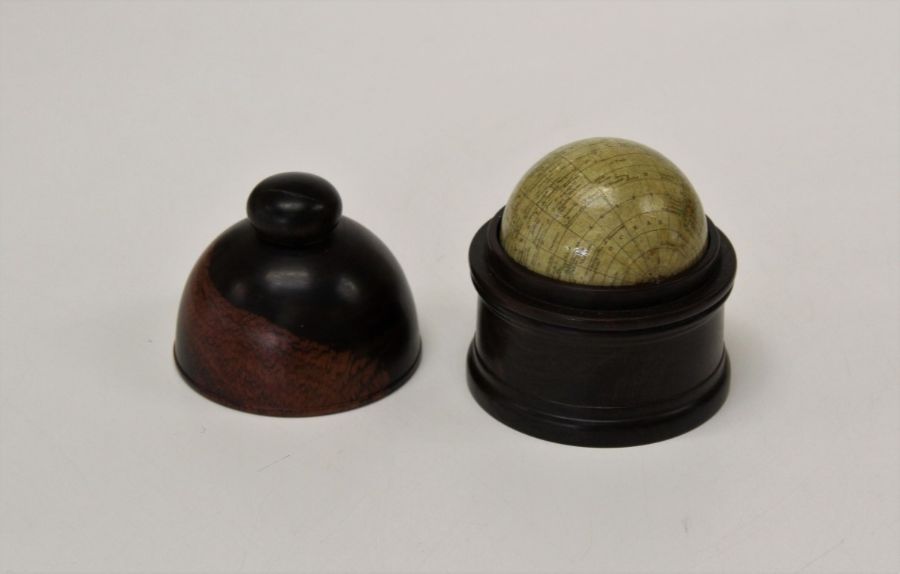 A good reproduction 3 inch globe, ' Woodward's Terrestrial' Housed in a lignum box with domed cover