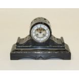 A late 19th century French varigated  marble and black slate drum head mantle clock, with eight