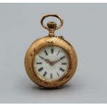 A Swiss ladies pendant watch, with Swiss marks for 14k. Winds but does not appear to run.