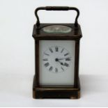 An early 20th brass, five glass carriage clock, the eight day movement faced by enamel Roman dial.