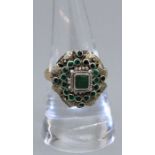 An antique Emerald set cluster ring. Circa 19th century in the style of Austro-Hungarian