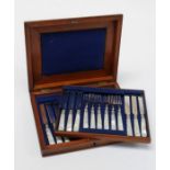 An Edwardian mahogany cased set of twelve EPNS mother of pearl handled tea knives and forks