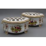 A pair of 20th century Crown Staffordshire posy holders, each of shaped oval form, polychrome