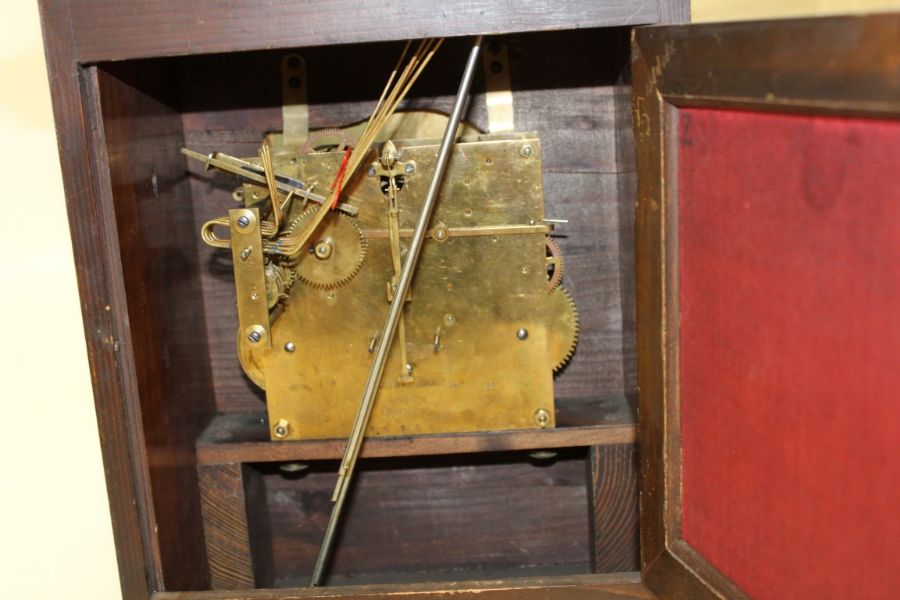 A late 19th century German mantle clock, the domed walnut case enclosing an eight day gong - Image 3 of 3