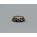 A five stone diamond ring in 18ct gold. An estimated total diamond weight of approximately 2.5ct.