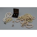 A selection of cultured and simulated pearl jewellery to feature a pair of 9ct gold cultured pearl