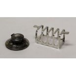 Mappin and Webb, a George VI silver four slice toast rack of small proportions, Sheffield 1936,