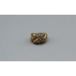 A yellow metal cubic zirconia set decorative ring, stamped with an Italian goldsmith's mark and 750,