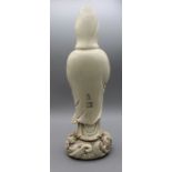 A Chinese Dehua ware figure of Guan Yin, Fukien Provence, early 20th century. Modelled standing upon