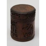 A 20th century Chinese carved bamboo box and cover, decorated in shallow relief with reserves of