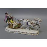 A Ludwigsburg porcelain figural group, modelled with a galloping horse drawing a sleigh driven by