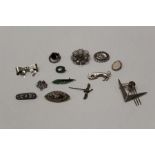 A collection of silver and white metal brooches to include filigree, micro mosaic, a plique a jour