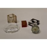 Five pieces of circa 1970's lucite, including a letter rack, two desk tidies and two paperweights