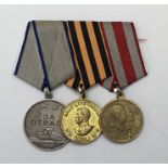 WW2 and later Soviet Russian medal group, mounted for wear. To include: a Medal for Courage, Medal