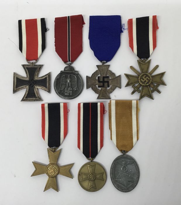 A collection of WW2 German medals. To include: an Iron Cross 2nd Class with makers mark ‘4’ on