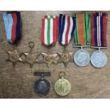 A collection of WWI and WWII medals of 1914-18 War Medal & Victory to 20665 PTE H. Wheeldon of the