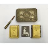 A scarce WW1 era Princess Mary tin with most of its original contents. To include: the pressed brass