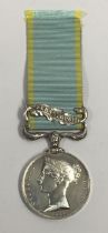 A Crimea medal with Sebastopol clasp. An unnamed example, with no evidence of any erasures. Complete