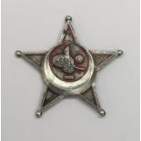 1915 Gallipoli star, with red lacquer painted surface, as issued to other ranks. Condition: worn