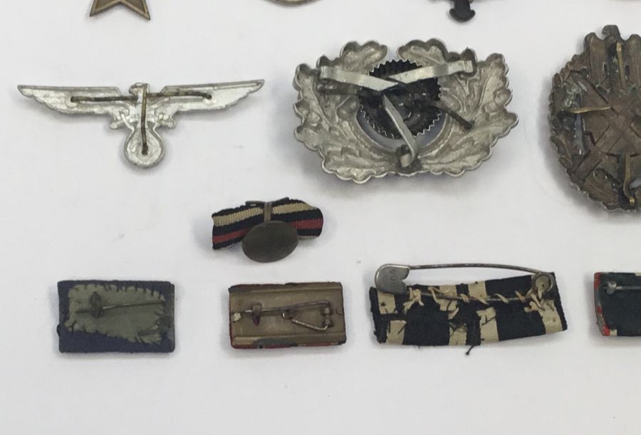 A selection of WW1 and WW2 German medals, badges and insignia. To include: a WW2 war merit cross - Image 12 of 15