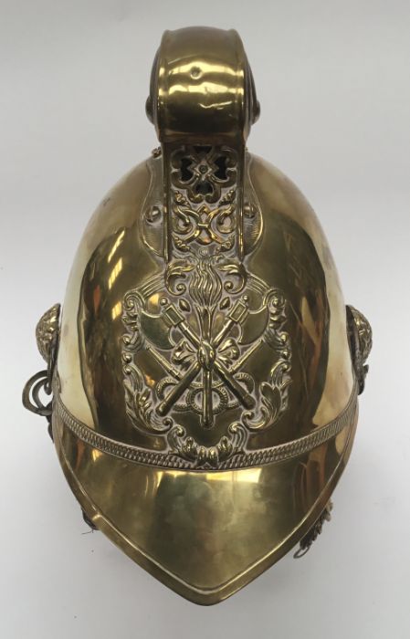 A late 19th / early 20th century brass fireman’s helmet by Merryweather & Sons of London. Standard - Image 3 of 10