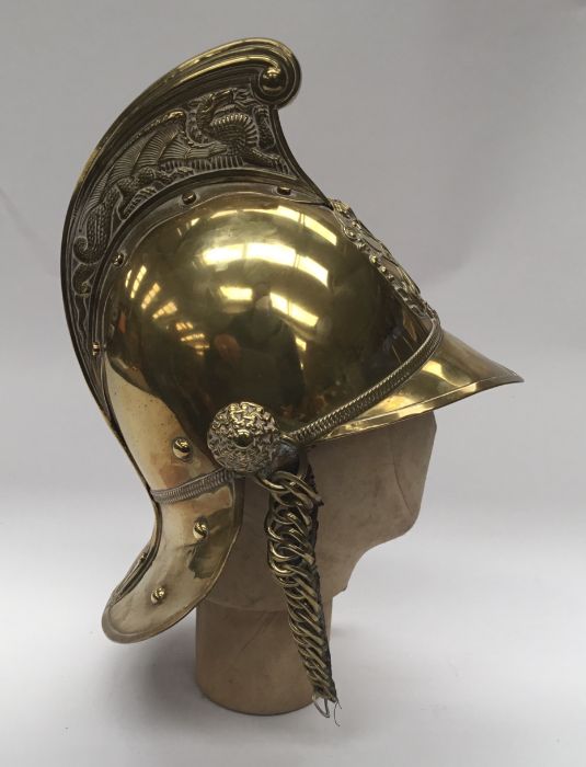 A late 19th / early 20th century brass fireman’s helmet by Merryweather & Sons of London. Standard - Image 6 of 10