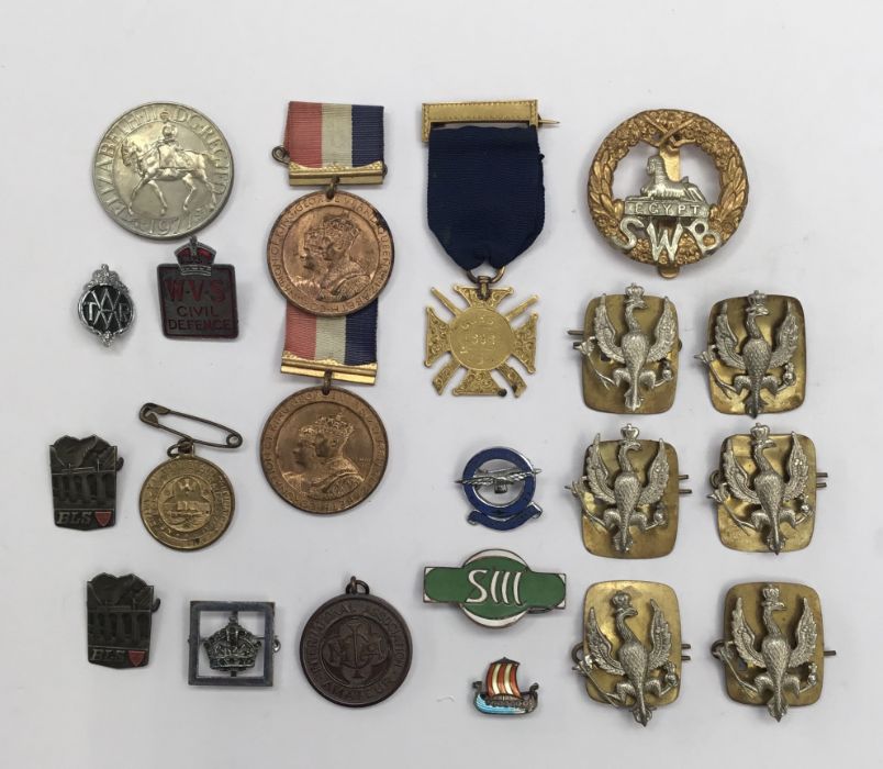 A selection of Victorian and later medallions and badges. To include: a scarce 55th (Leigh)