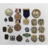 A selection of Victorian and later medallions and badges. To include: a scarce 55th (Leigh)