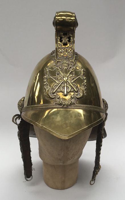 A late 19th / early 20th century brass fireman’s helmet by Merryweather & Sons of London. Standard - Image 2 of 10