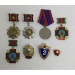 A selection of post WW2 Soviet Russian Medals and Badges. To include: A medal for distinction in