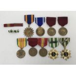 A selection of United States medals. To include: an early 1950’s USN medal pair and ribbon bar to