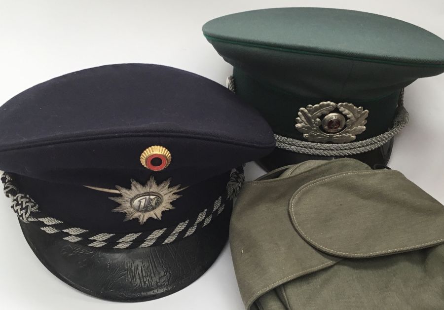 A selection of post WW2 European military caps. To include: 4 East German examples, a German naval - Image 4 of 9
