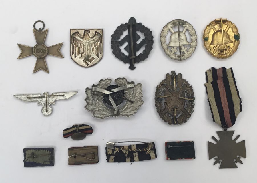 A selection of WW1 and WW2 German medals, badges and insignia. To include: a WW2 war merit cross - Image 8 of 15