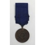 An 8 year SS service medal. Marked ‘Für Treue Dienst In Der SS’ in raised letters. Correct