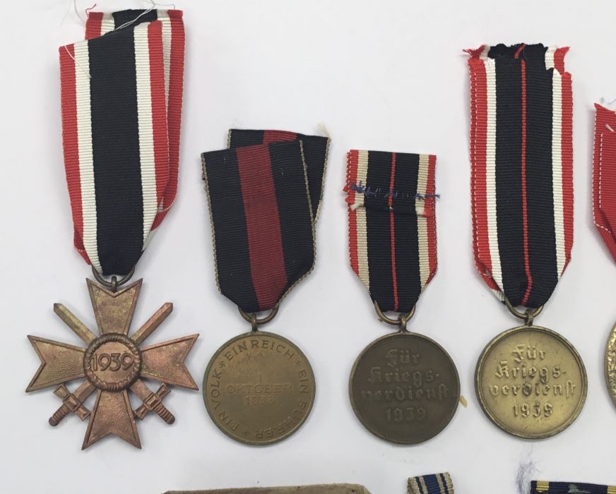 A selection of German WW2 and earlier medals. To include: a War Merit cross with swords (marked 33 - Image 8 of 8