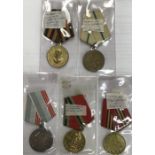 A selection of Soviet Russian medals. To include: Medal for the capture of Berlin. Medal for the