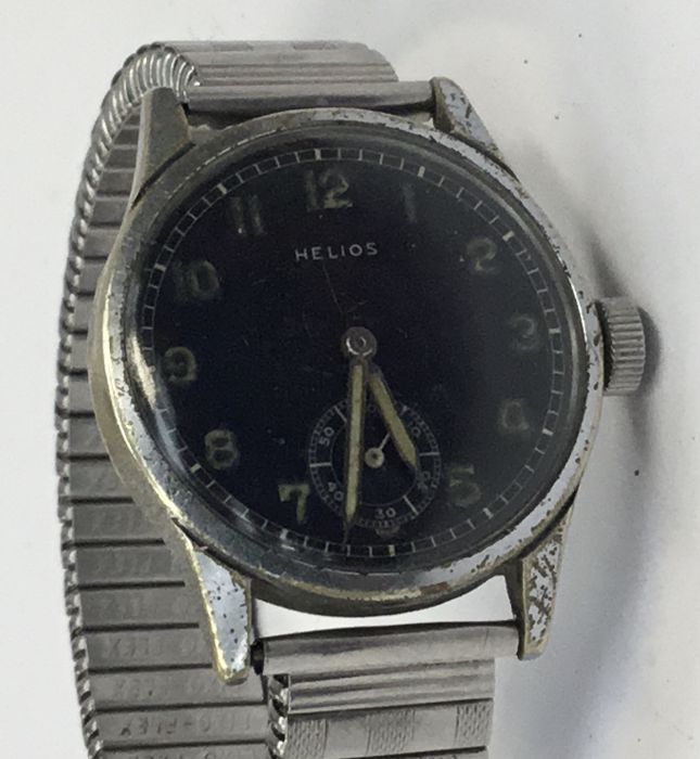 A WW2 German military wristwatch by Helios, together with a hand made aluminium cigarette case, - Image 4 of 9