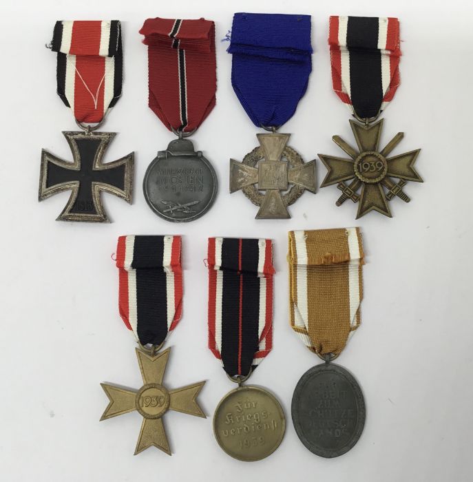 A collection of WW2 German medals. To include: an Iron Cross 2nd Class with makers mark ‘4’ on - Image 5 of 5
