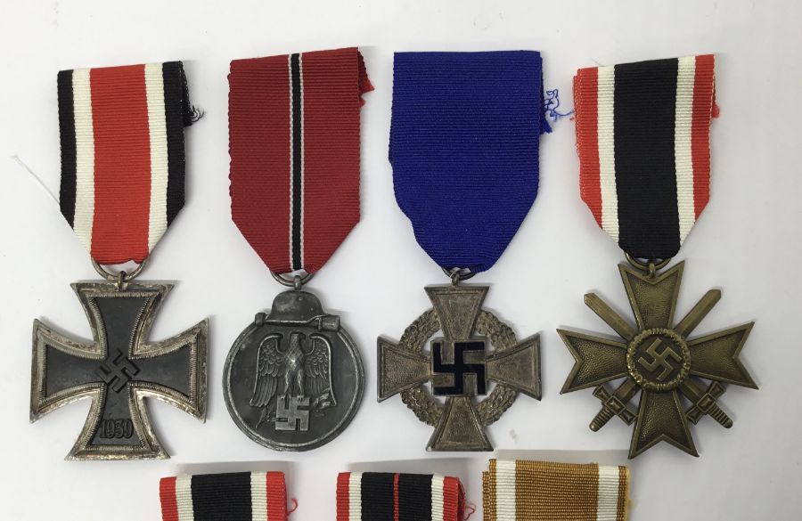 A collection of WW2 German medals. To include: an Iron Cross 2nd Class with makers mark ‘4’ on - Image 2 of 5